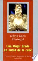 Una mujer tirada en mitad de la calle